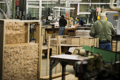 Photographer Brent Harrewyn captured Malcolm Cooper Jr. and the busy work floor at JK Adams.