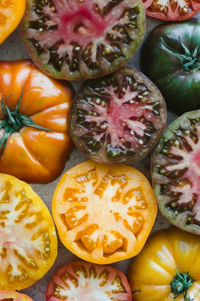 To photograph these juicy heirloom tomatoes, I cut them in half