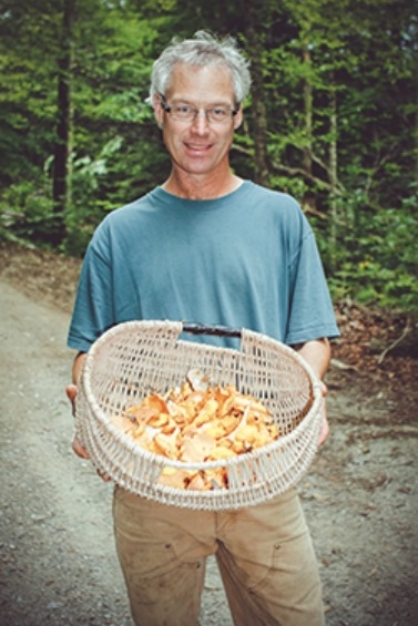 Cranberry Bob holding Vermont mushrooms