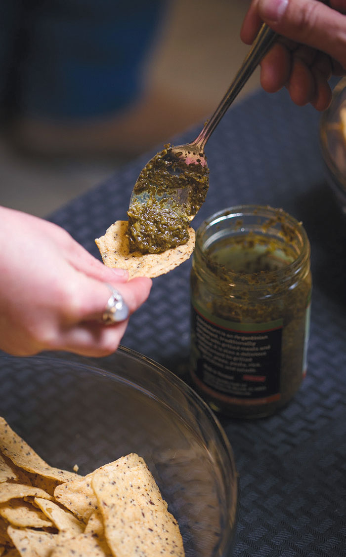 Jehshua Barnes serves chimichurri