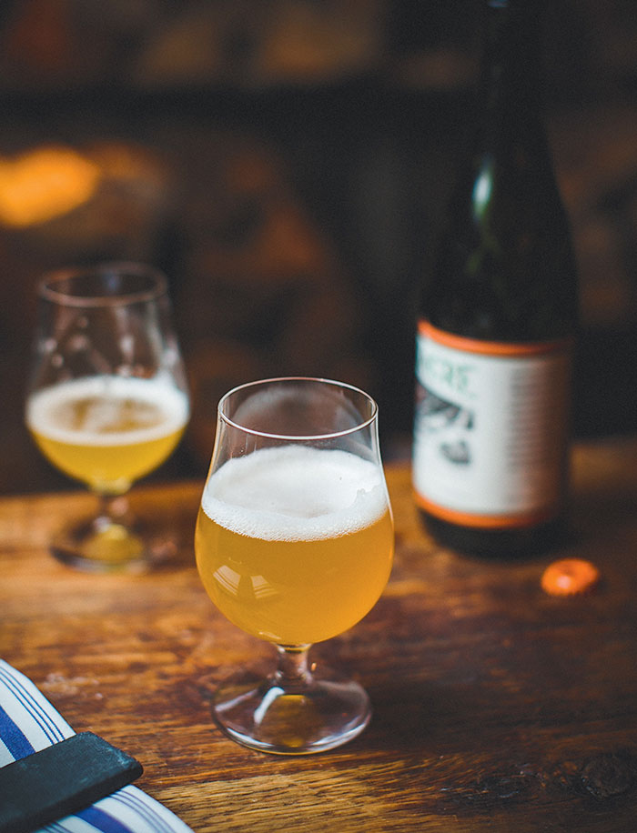 A glass of Sour Golden Ale